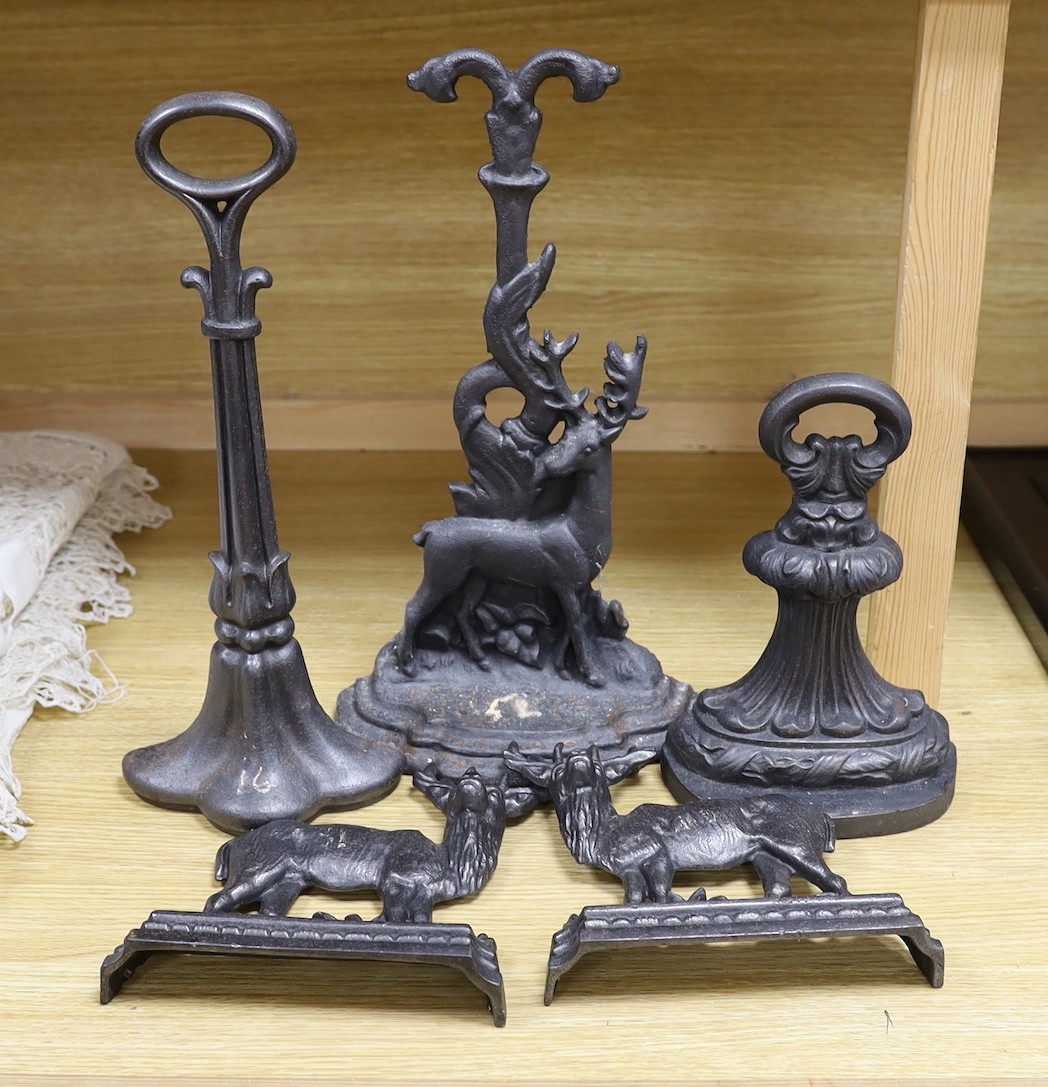 5 cast iron door stops, three of deer, tallest 39.5 cms high